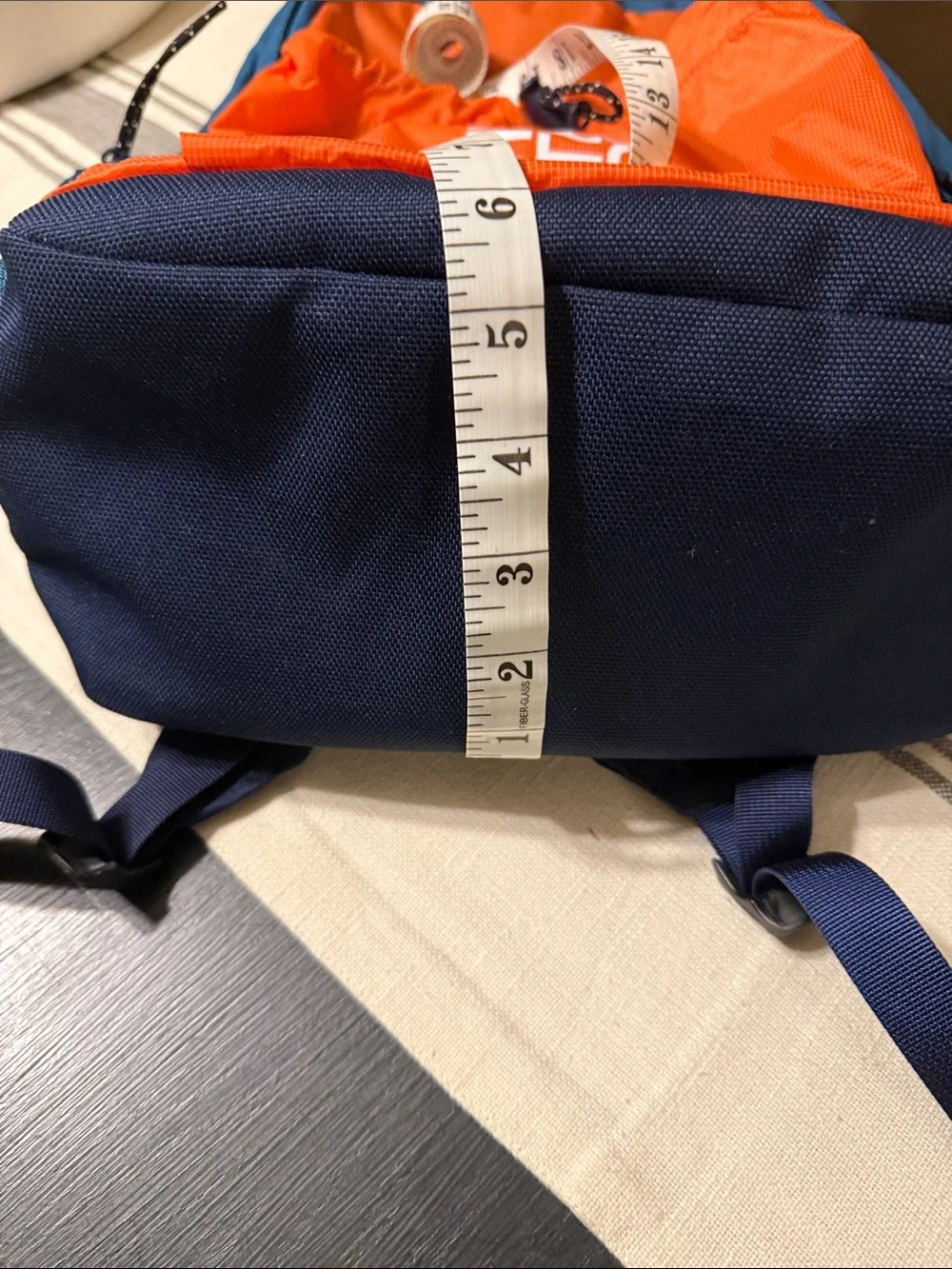 The North Face  Bozer backpack, retro orange, navy, dark teal